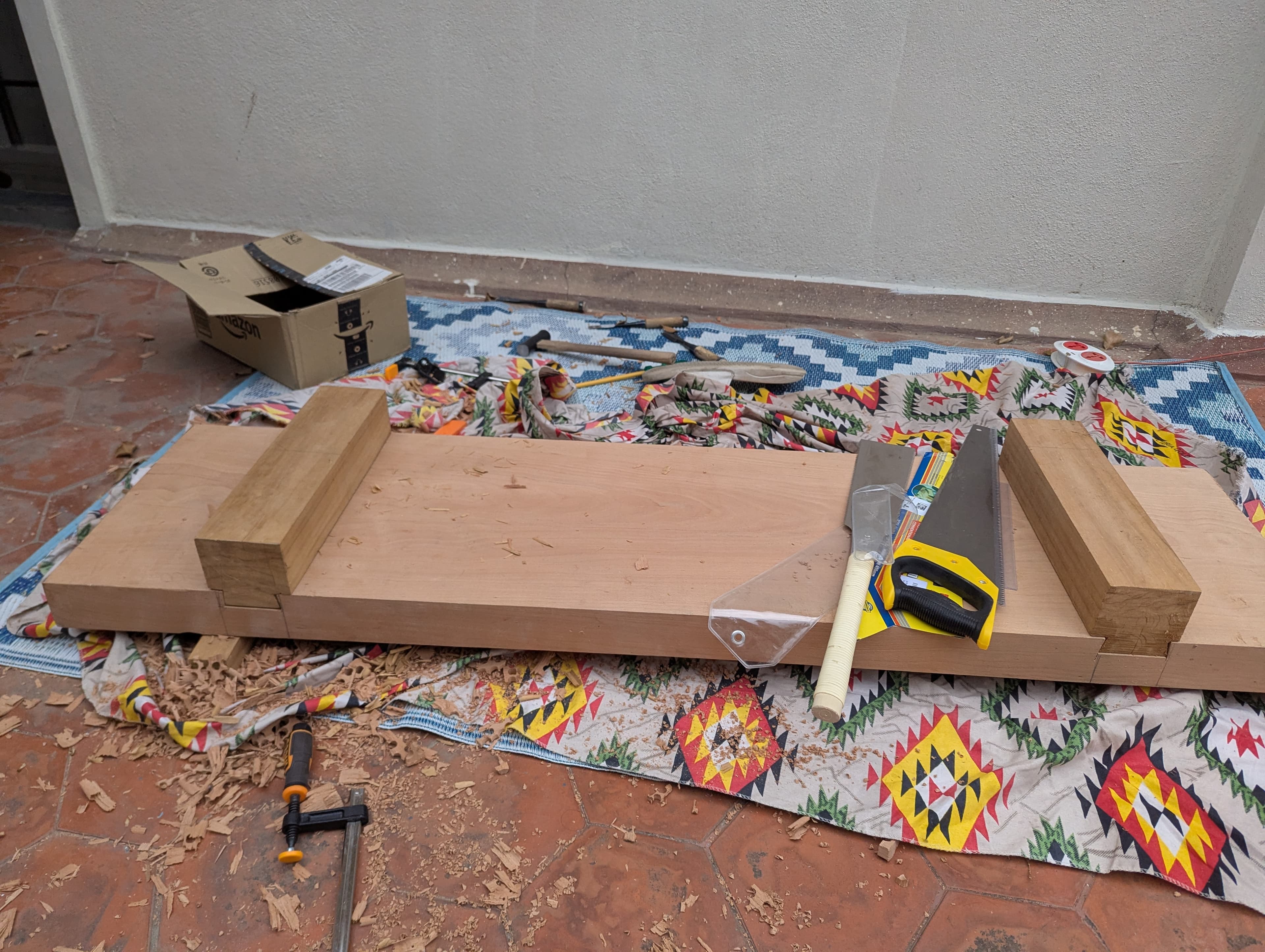 Both legs fitted into sliding dovetail sockets on the underside of the atedai body